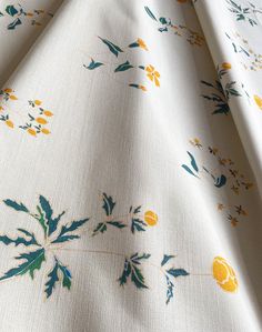 the fabric has yellow flowers on it