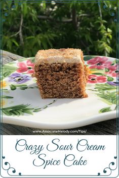 a close up of a piece of cake on a plate with the words crazy sour cream spice cake