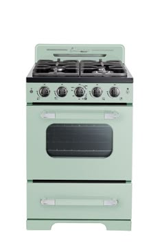 a green stove top oven sitting next to a white wall with two burners on it