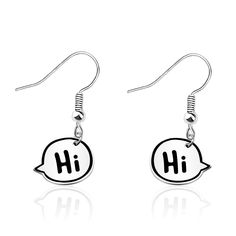 two silver earrings with the letter h on them