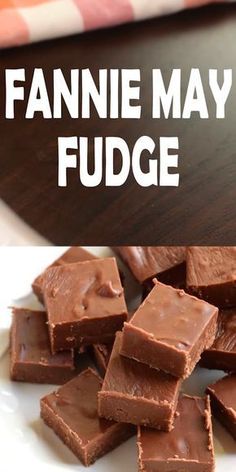 a white plate topped with fudge brownies next to a pile of fudge