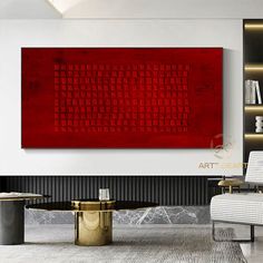 a living room with a large red painting on the wall