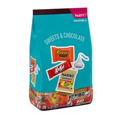 a bag of sweets and chocolate on a white background