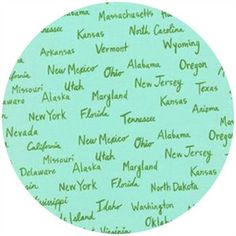 a green circle with the names of cities in different languages on it's surface