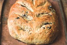 a loaf of bread sitting on top of a pan