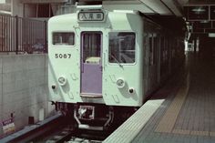 a train is pulled up to the station