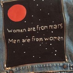 the back pocket of a jean jacket with words written on it that says women are from mars men are from women