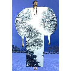 a woman standing in the snow with trees on her head and an image of a man's face