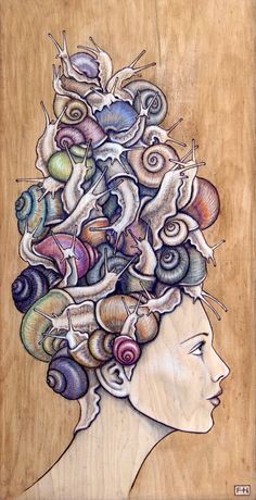 a drawing of a woman's head with seashells in her hair on a wooden background