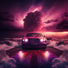 a car is parked on the beach at night with clouds and stars in the sky