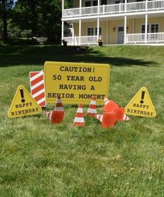 caution signs and cones in front of a house