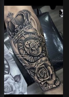 a man's arm with a clock and roses on it