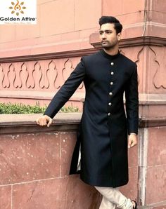 This is a Premium Sherwani by Golden Attire crafted from high quality fabric and imported materials. Our products are handcrafted by experienced tailors who make sure the that the stitching is precise, lining is proper and the overall product is sturdy enough to not go out of shape for more than a few years. Also all our products have extra margins in their length, sleeves, sides so it's easily alterable if your size changes after some time. To see more available colours and designs in this coll Elegant Long Bandhgala For Traditional Ceremonies, Elegant Long Sherwani For Traditional Ceremonies, Bollywood Style Sherwani For Diwali, Bollywood Style Semi-formal Sherwani For Diwali, Traditional Semi-formal Sherwani With Pallu, Semi-formal Bollywood Style Fitted Sherwani, Fitted Bollywood Sherwani For Semi-formal Occasions, Black Fitted Sherwani For Traditional Ceremonies, Fitted Black Sherwani For Traditional Ceremonies