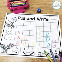 roll and write game with markers, pencils, and crayons on a table