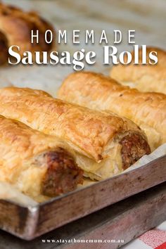 homemade sausage rolls on a baking sheet with text overlay that reads homemade sausage rolls