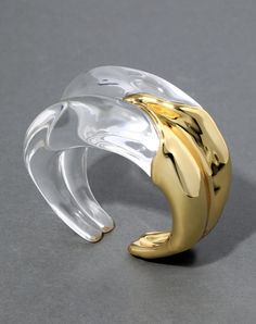 Molten 14k gold plated metalwork washes over hand-sculpted clear liquid Lucite for this ultramodern hinged cuff. Inspired by the fluidity of waves in motion with light reflecting from its bold sculptural rippled silhouette. Alexis Bittar Jewelry, Women Bracelet, Stacked Bangles, Gold Bracelet Cuff, North South, Alexis Bittar, Earring Sale, Jewelry Inspo, Luxury Women