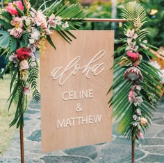 a wooden sign that says aloha, celine and mathew