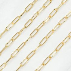 Gold Plated 925 Sterling Silver Paperclip Link Chain HIGH-QUALITY GOLD-PLATED PAPERCLIP CHAIN! This modern and on-trend design is crafted from Gold Plated 925 Sterling Silver  Item number: V31GP  Smooth Link Size: 13x5mm. Dimond Cut Link Size: 13x5mm Chain Style: Paperclip Metal: Gold Plated 925 Sterling Silver Length: sold by the foot. Choose the amount in the drop-down menu Processing time: 1-2 business days FAST SHIPPING! - Gold Plated 925 Sterling Silver 100% - If this chain is kinked, knotted, or pulled it is easily damaged. We have many other more durable chain options available. We carry the highest quality of sterling silver, gold-filled chains, various jewelry findings, supplies, and charms. To view our entire collection, please visit our storefront here: https://www.etsy.com/shop Permanent Jewelry, Diamond Quartz, Yellow Gold Chain, Silver Enamel, Jewelry Business, Gold Plated Chains, Gold Filled Chain, Gold Plated Silver, Blue Opal