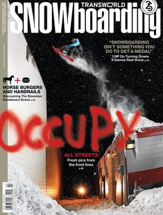 the cover of snowboarding magazine shows a person on a snowboard in mid air