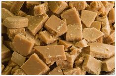 a pile of brown sugar cubes sitting on top of each other