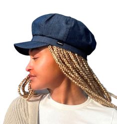 Our New CRAGGI Dark Denim Blue Baker Boy Hat features a matching Blue lining on the inside.The elasticated fitting will help you brave the wind and makes it one size fits all. This hat is a perfect fashion accessory for a day around town,holiday, travel, Festivals and nights out with friends. Whether you're on Campus ,outdoors walking or running errands it's the perfect cap to match with your outfits. One Size - 56-60cm with an elasticated back for a perfect fit. The dark denim fabric makes a great unisex style. 100% Denim outer fabric Style with one of our CRAGGI scarves or shawls to complete your look. Please subscribe at www.craggi.com for the latest news on our collections. Adjustable Cotton Casual Beret, Spring Casual Flat Cap Beret, Casual Spring Beret Flat Cap, Casual Adjustable Beret With Short Brim, Casual Adjustable Visor Beret, Casual Cotton Beret For Spring, Casual Adjustable Brimmed Beret, Casual Brimmed Beret One Size Fits Most, Casual Visor Beret For Spring