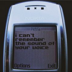 an old nokia cell phone with the message i can't remember the sound of your voice