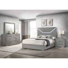 a bedroom scene with focus on the bed, dresser and mirror in the middle area