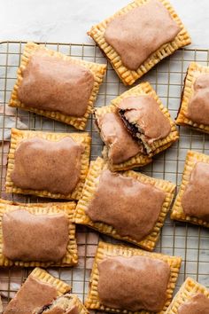 several small pastries on a cooling rack