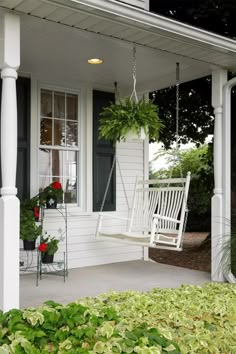 Accent your front porch with our Amish Ash Wood Fanback Loveseat Swing. Handcrafted by skilled Amish artisans, this porch swing offers nearly four feet of blissful lounging space. Crafted from solid ash wood, it's a durable and stylish addition to your outdoor oasis. Whether you're seeking solitude or family fun, this swing creates the perfect atmosphere. Dive into serenity with every gentle sway. Wood Porch Swings Hanging, Rocking Chairs On Porch, White Rocking Chairs On Front Porch, Porch Swing Aesthetic, Small Farmhouse Porch, Front Porch Swing Ideas, Modern Farmhouse Front Porch Decor, Porch Swings Hanging, Front Patio Design