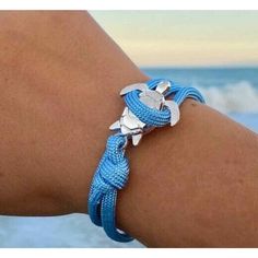 Beach Wear Accessory Blue Rope Silver Sea Turtle Bracelet One Size Fits All Details: * Sea Turtle Charm: 25mm * Eco-Friendly Alloy With Silver Finish * 4mm Thick Blue Rope * Adjustable Size Fits All E-6-Epm Adjustable Blue Jewelry For Vacation, Adjustable Blue Beach Jewelry, Adjustable Blue Jewelry For Beach, Nautical Blue Bracelets As A Gift, Nautical Blue Bracelets For Gifts, Blue Nautical Bracelets As Gifts, Adjustable Blue Ocean-inspired Bracelet, Blue Nautical Bracelets For Gift, Adjustable Blue Strand Jewelry