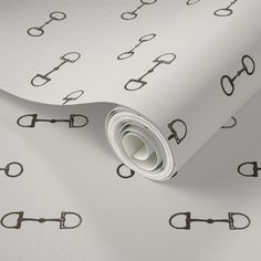 an image of a white wallpaper with black letters and glasses on the paper background