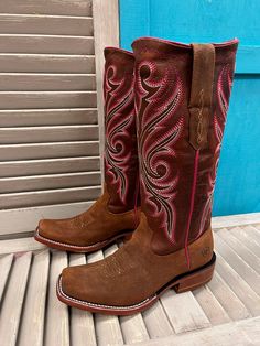 Designed in collaboration with 26x World Champion Cowboy Trevor Brazile, our Relentless Futurity collection is a modern take on tradition for today’s cowgirl. This punchy, stovetop-style boot is easy to pull on, thanks to secret stretch panels. An extra layer of heel-to-toe cushioning keeps you going all day. Features ATS® technology provides ergonomic support on uneven terrain TekStep provides toe-to-heel cushion for comfort StretchFit panels under the pull tabs give an additional inch to fit a Trevor Brazile, Square Toe Cowgirl Boots, Cowgirl Boots Square Toed, Cowgirl Outfit, Ariat Boots, Western Store, Boot Companies, Cowgirl Western, Veg Tan Leather