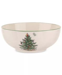 a bowl with a christmas tree painted on it