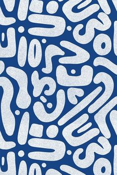 an abstract blue and white background with many different types of writing on it's surface