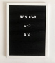 a black and white sign that says new year who dis