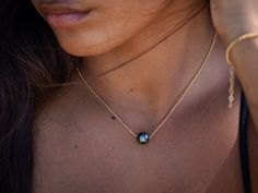 Introducing your new favorite everyday Tahitian pearl necklace. This classic floating pearl necklace is beautiful both when worn alone or stacked with your favorite layering chains. Available in both solid sterling silver and tarnish-resistant gold filled chain options. Length : 16 inches + 2 inch extender About the Pearl :  - 1 x Genuine Tahitian Black Pearl Purchased in Tahiti - 9.5-10mm - B/C Quality, Dark Color, Minimal Imperfections PLEASE NOTE : The necklace bracelet pictured is a represen Layering Chains, Floating Pearl Necklace, Tahitian Pearl Necklace, Tahitian Black Pearls, Tahitian Pearls, Dark Color, Pearl Chain, Gold Filled Chain, Black Pearl