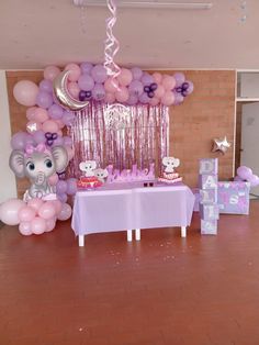 an elephant themed birthday party with balloons and decorations