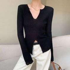 image_1 Black Long Sleeve Knit Top For Fall, Versatile Black Winter Knit Top, Chic Black Knitted Tops, Versatile Black Sweater For Winter, Versatile Black Sweater For Layering, Trendy Black V-neck Sweater For Fall, Chic Black Sweater For Layering, Chic Knitted Sweater, Elegant Black Knitted Top