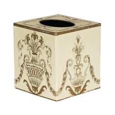 an ornately decorated tissue box on a white background