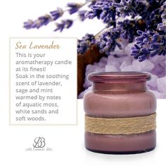 a purple vase with lavender flowers in the background and an advertise that reads, saa lavender this is your aroma therapy candle at its finest