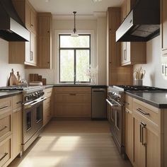 a kitchen with wooden cabinets and stainless steel appliances