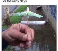 someone holding an umbrella in their hand with the caption, for the rainy days