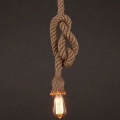 a light bulb that is hanging from a rope