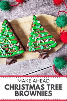 two christmas tree brownies on a cutting board