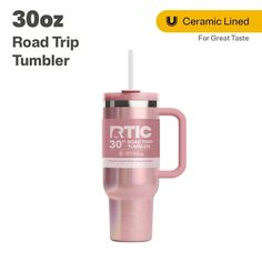 a pink travel mug with the words rcc on it and an image of a road trip