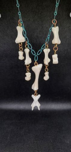 We got some bones here. Also some teeth. Also a lot of chain and work with a jewelry drill. I got so hyperfocused on making the bone beads I gave myself a blister on my palm. Did you know that was a thing? I didn't! Pride Bracelet, Horn Pendant, Bone Beads, The Bone, A Thing, Cute Jewelry