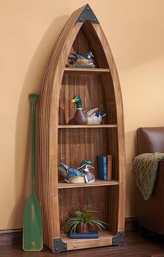 Rustic Canoe. Nautical Corner Shelves, Corner Shelf Boat, Narrowboat Shelves, Paddle Shaped Shelf, Boat Shape Book Shelf, Reclaimed Boat Furniture, Aquatic Bedroom, Boat Shelf Decor, Shelf Cabin