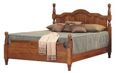 a bed with wooden headboard and foot board is shown against a white background,