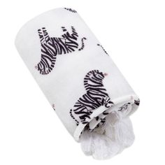 a white towel with zebras on it