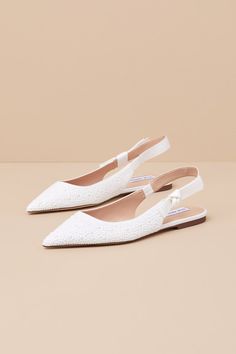 Make any day ultra-chic with the Steve Madden Olsen-P Pearl Knotted Pointed-Toe Slingback Flats! Gleaming, faux pearl studs cover soft woven fabric as it shapes a pointed-toe upper and a low-cut collar. The wide slingback strap boasts a cute, knotted detail at the outstep (and a bit of elastic at the instep for fit). 0. 25" rubber heel. Cushioned insole. Felted rubber sole has nonskid markings. Man Made Materials. Imported. Lulus | Olsen-P Pearl Knotted Pointed-Toe Slingback Flats | Size 6.5. White Ballet Flats, Slingback Flats, Closed Toe Shoes, Tie Shoes, Rubber Heels, Pearl Size, Pearl Studs, Low Cut, Faux Pearl